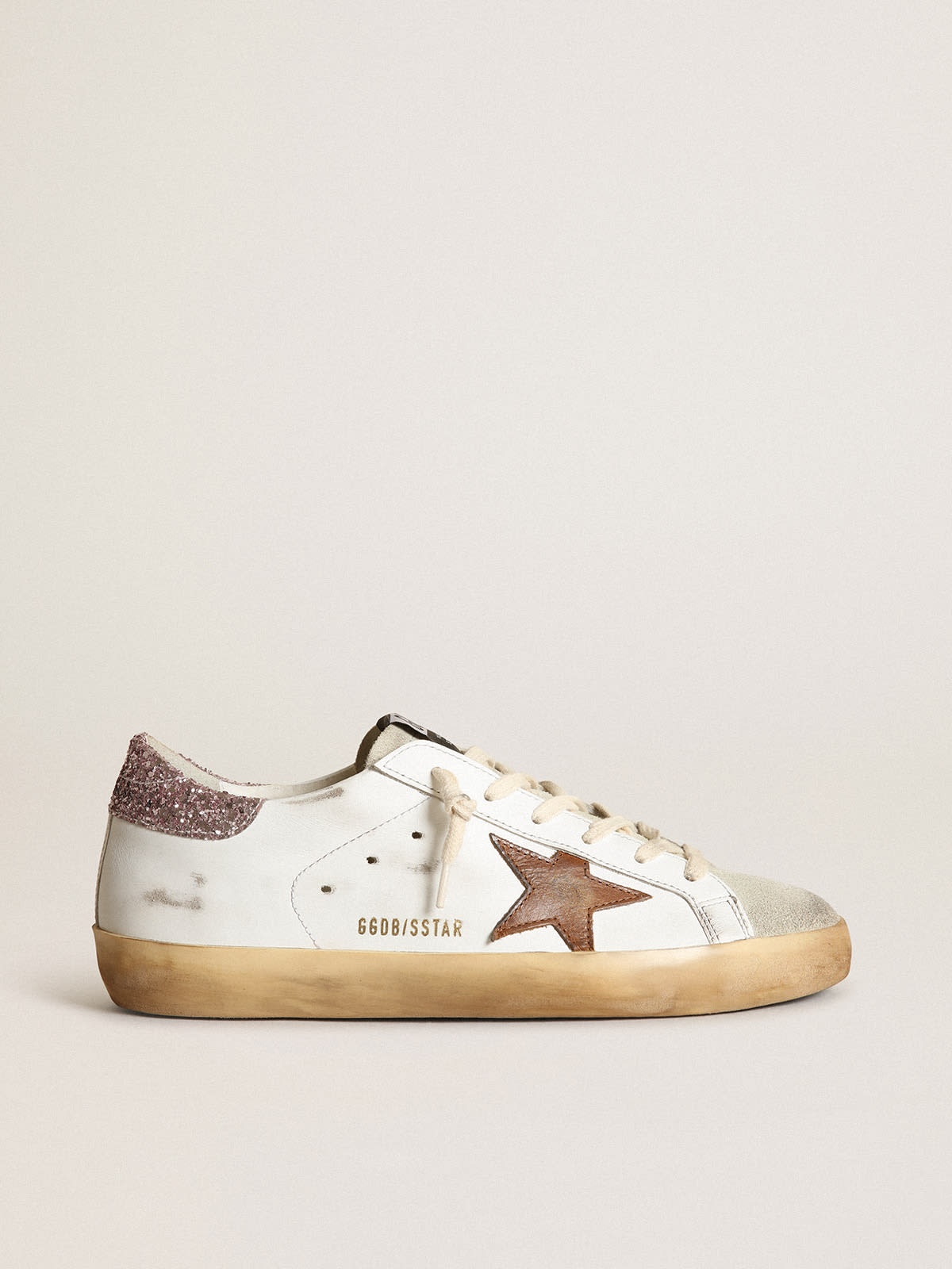 Golden Goose Super-Star with a tan star and pink glitter heel tab |  REVERSIBLE