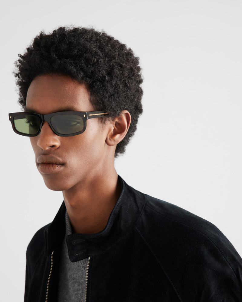 Prada Sunglasses with the iconic metal plaque outlook