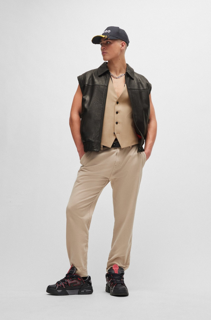 HUGO LEATHER JACKET WITH DETACHABLE SLEEVES AND STUD ARTWORK outlook