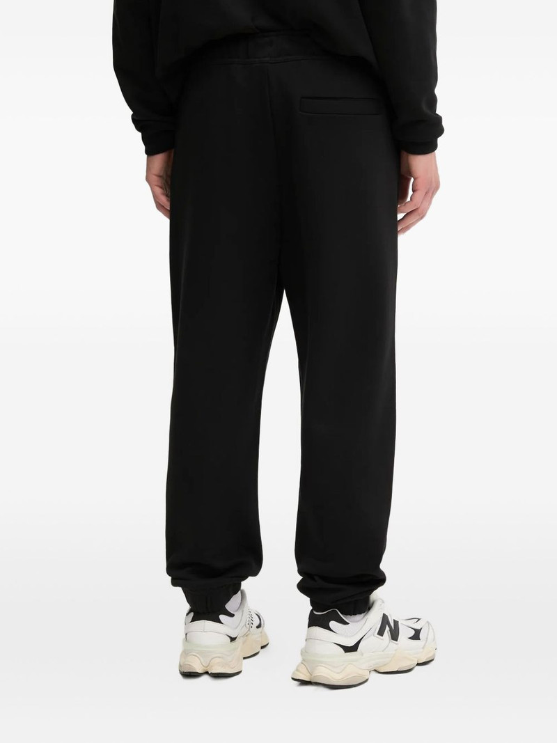 HUGO logo-print track pants outlook