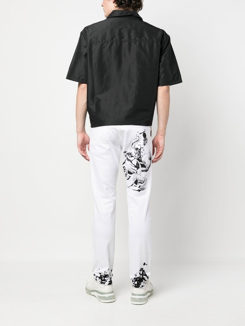 PHILIPP PLEIN graphic-print slim-cut jeans outlook