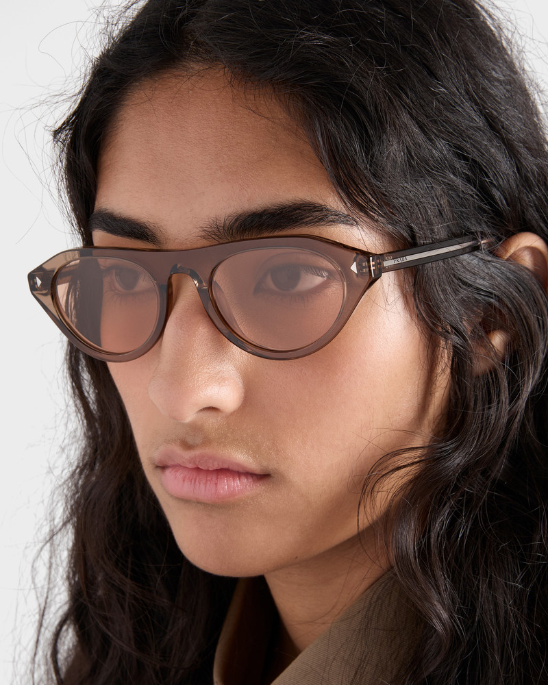 Prada Prada sunglasses with the iconic metal plaque outlook