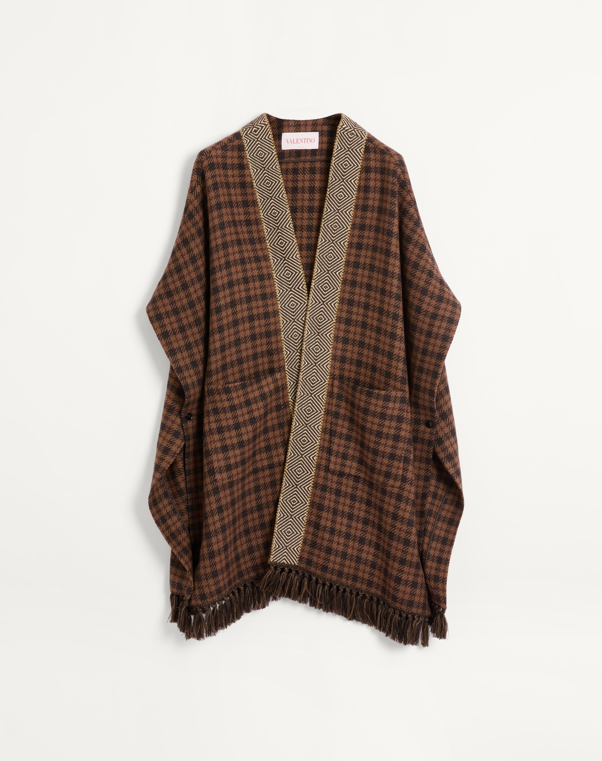 WOOL CAPE WITH JACQUARD TRIM AND TASSELS ON THE HEM - 1