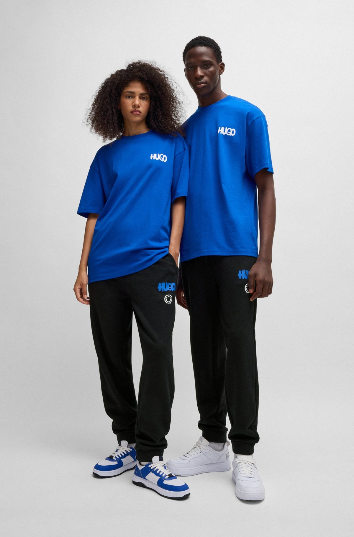COTTON-TERRY TRACKSUIT BOTTOMS WITH HAPPY HUGO LOGO - 4