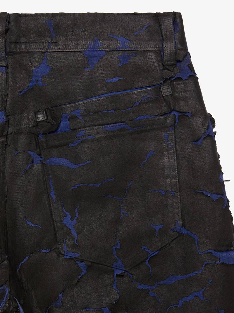 JEANS IN PAINTED CRACKED DENIM WITH ZIPPERS 5