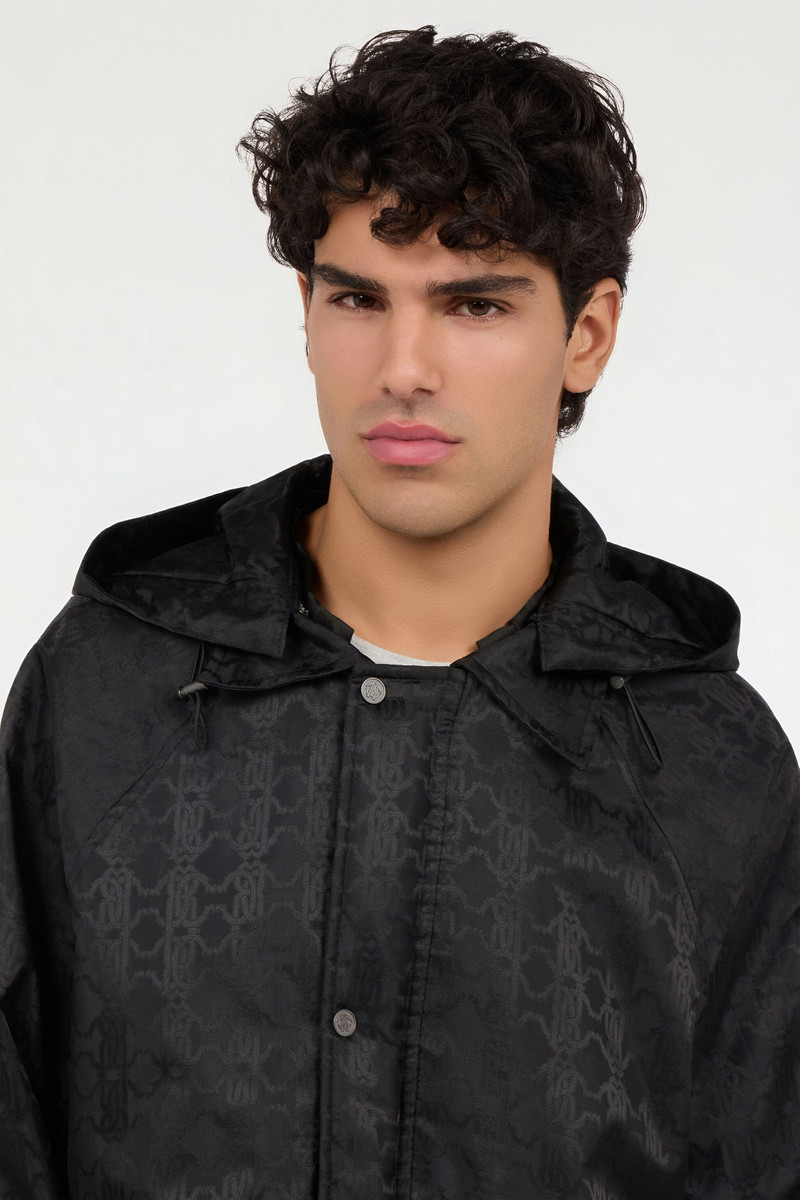 Black caban with RC monogram all over 6