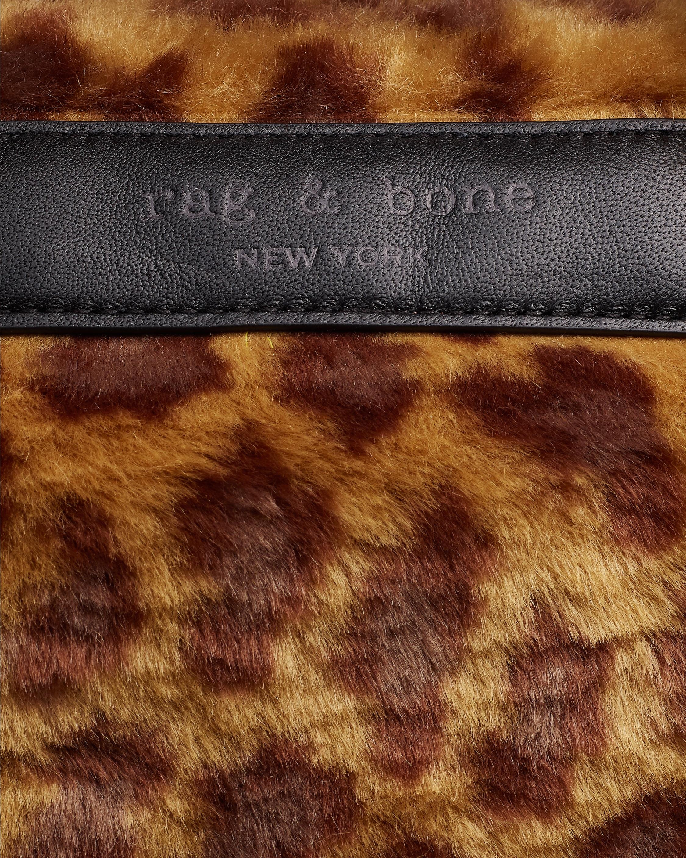 Cloud Duffle - Faux Fur
Mini Duffle Bag - 5