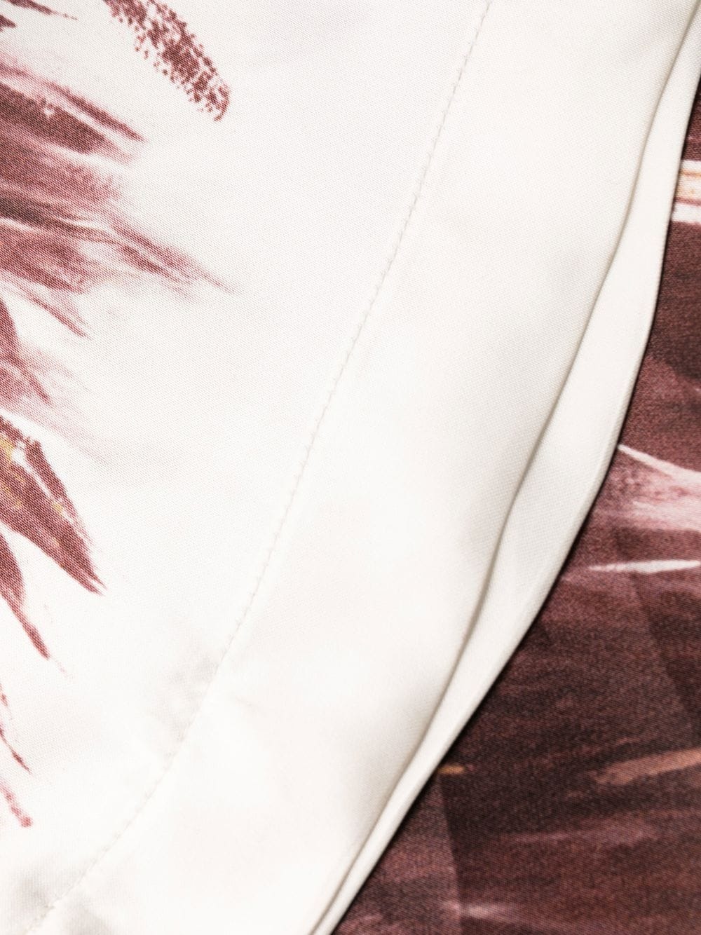 graphic-print flared trousers - 8