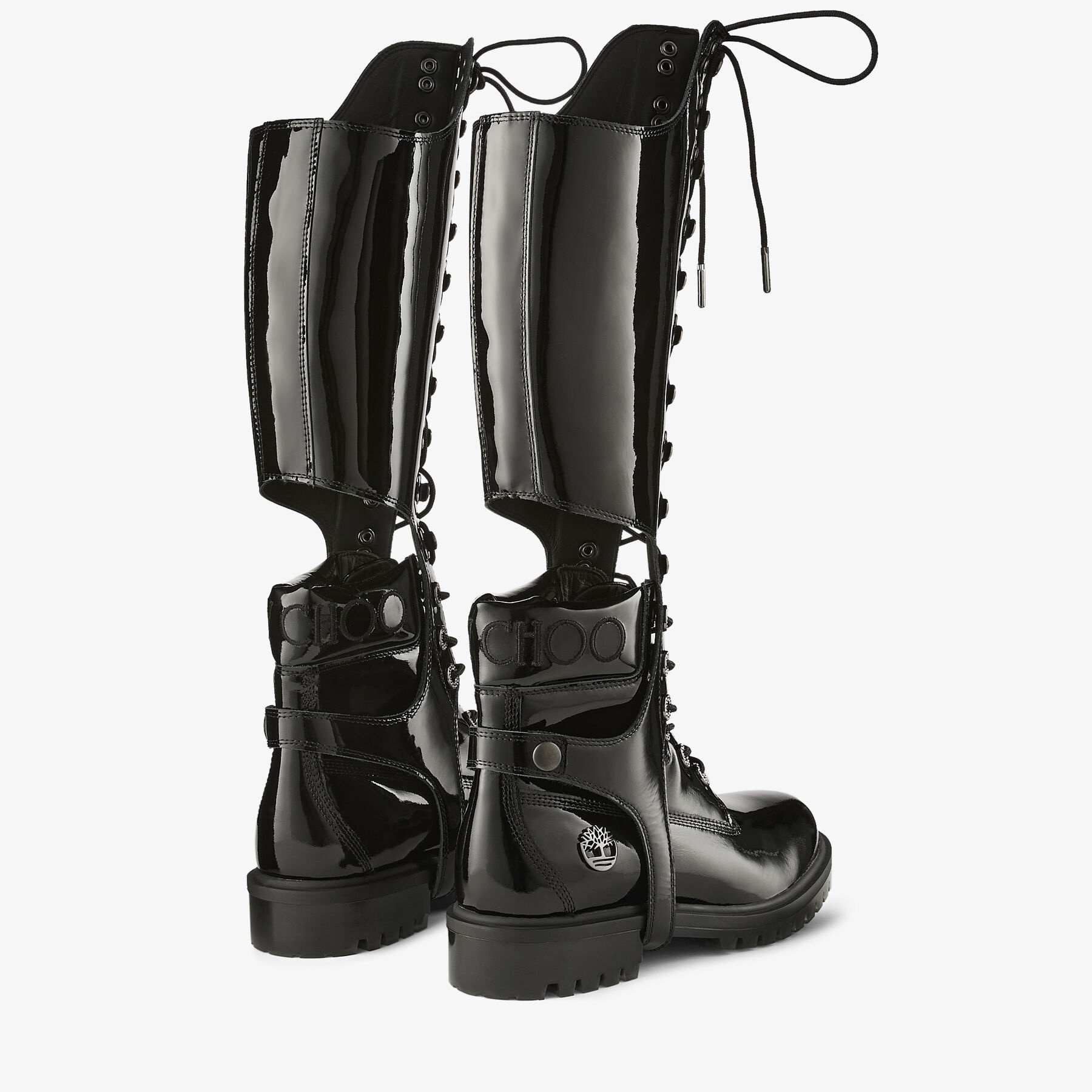 JIMMY CHOO X TIMBERLAND PATENT LEATHER HARNESS BOOT
Black Timberland Patent Knee High Boots with Det - 8