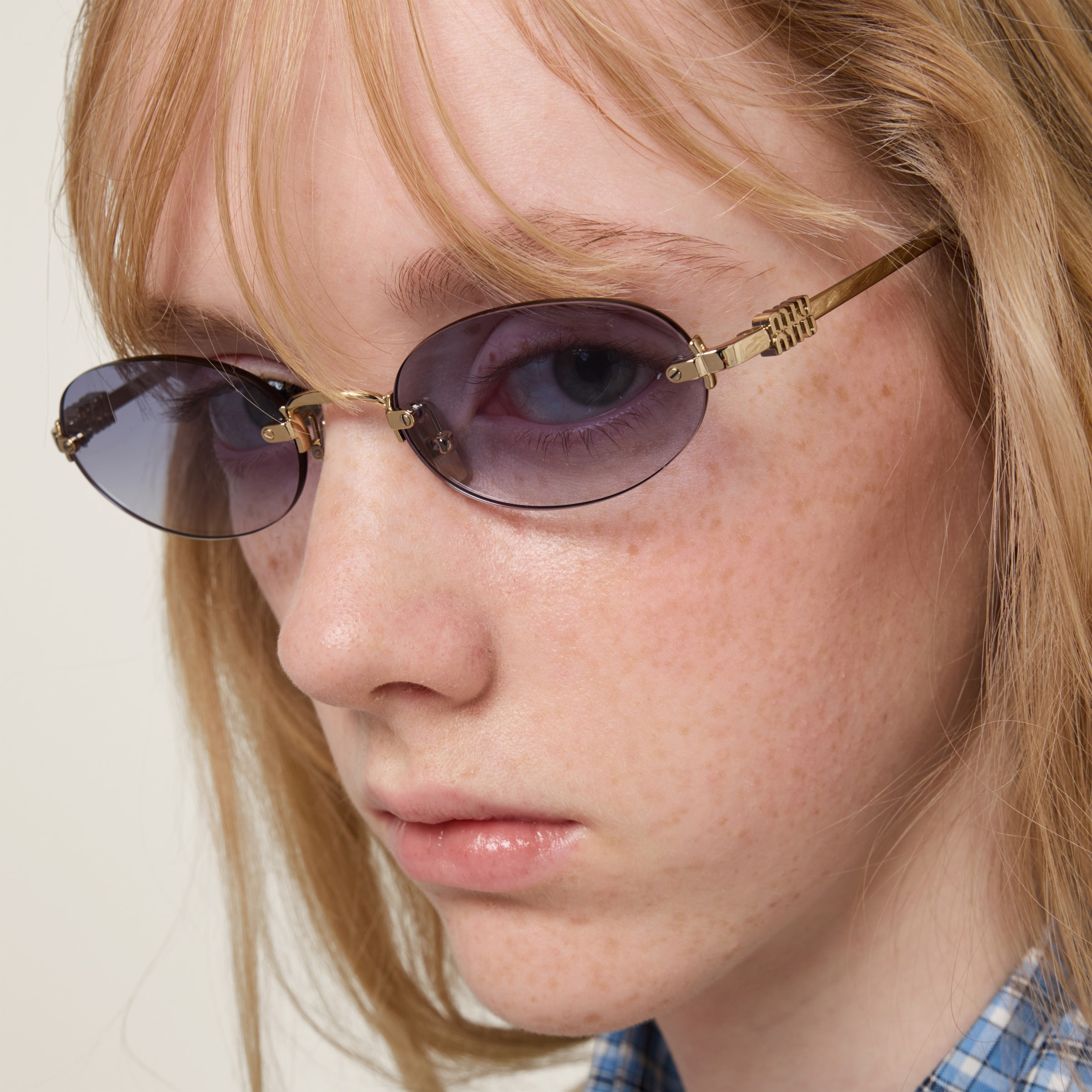 Miu Miu Miu Miu Logo sunglasses | REVERSIBLE