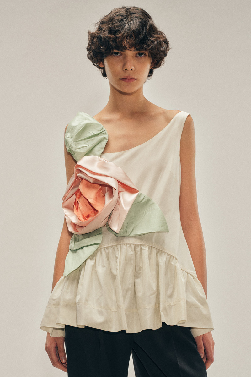 Pressed Rosette Tilted Neck Peplum Top 4
