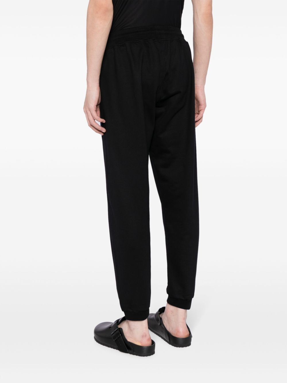 Alkhws logo-print cotton track pants - 4