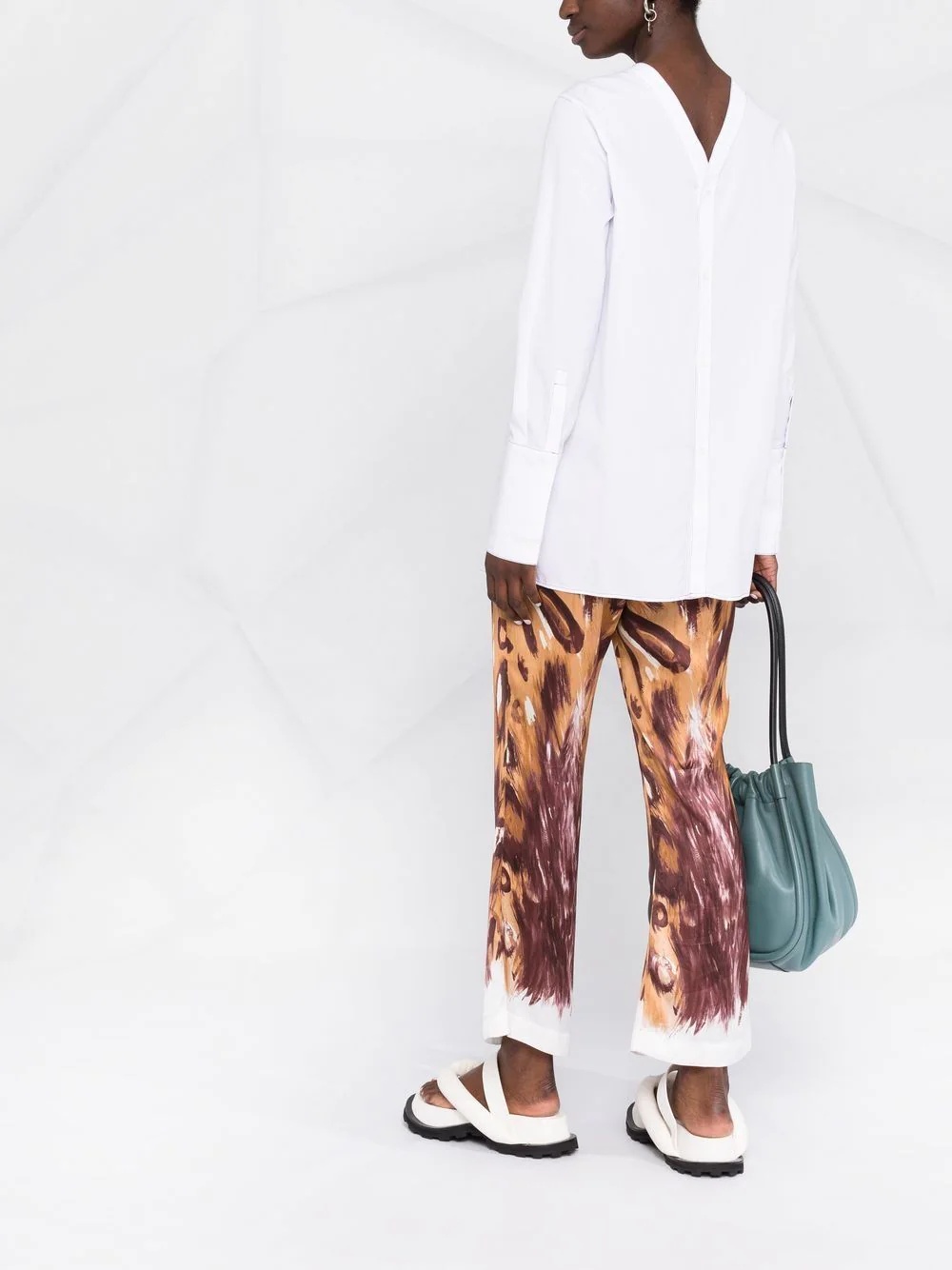graphic-print flared trousers - 4