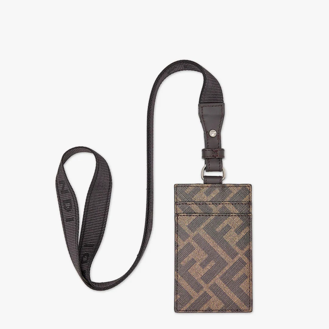 Vertical card holder with 2 slots front and back. Logo webbing strap. Made of textured fabric with b - 2