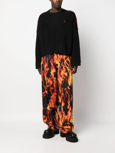 VETEMENTS fire-print elasticated-waist cotton trousers outlook