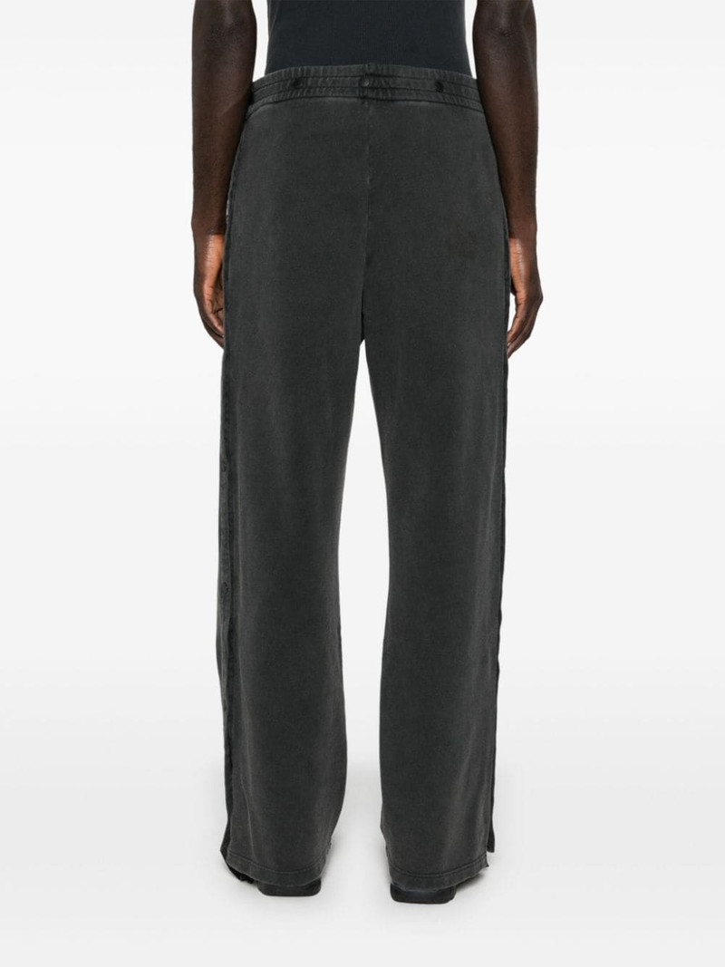 layered track pants 5