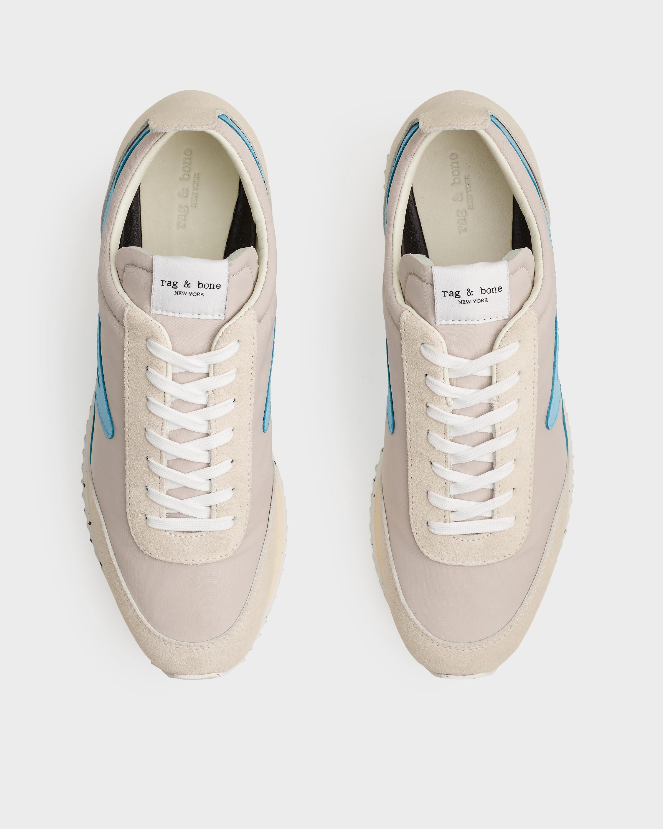 Retro Runner
Leather and Recycled Material Sneaker - 3