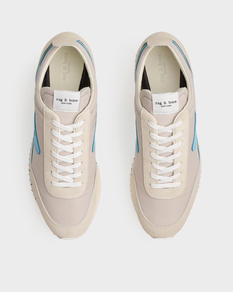 Retro Runner
Leather and Recycled Material Sneaker 3
