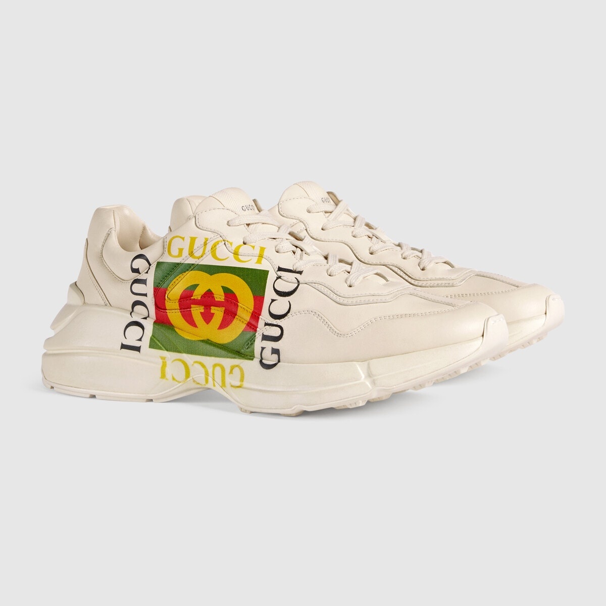 GUCCI Men's Rhyton Gucci logo leather sneaker | REVERSIBLE