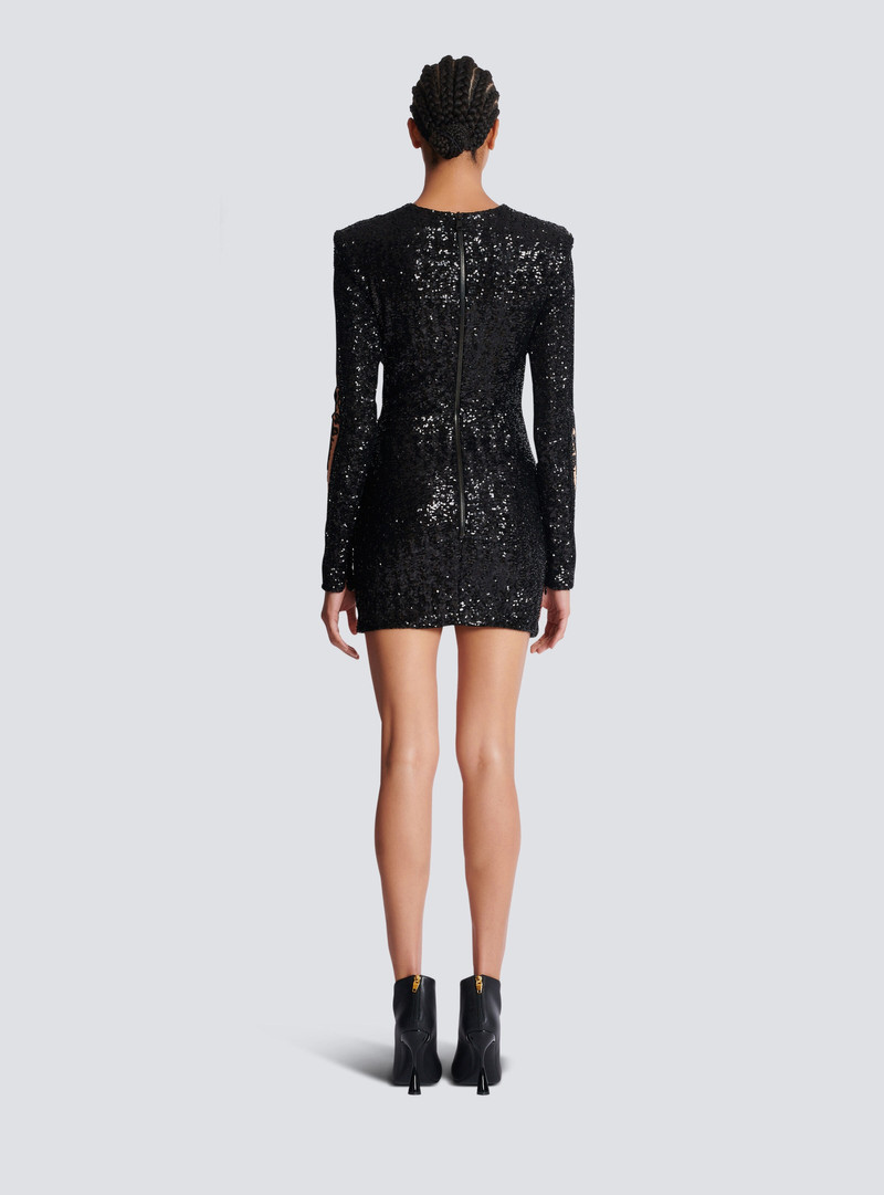 Short embroidered dress with body motif 4