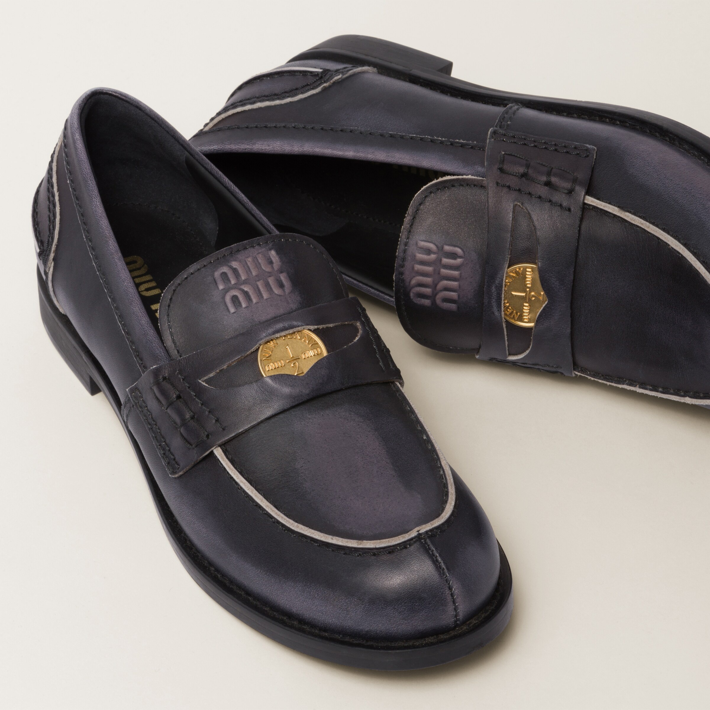 Miu Miu Vintage-effect leather loafers | REVERSIBLE