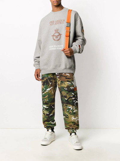 Heron Preston camouflage print track trousers outlook