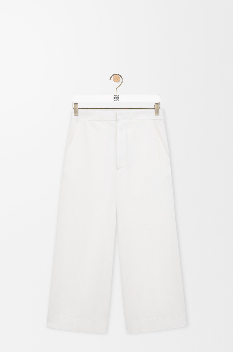 Cropped trousers in denim 1
