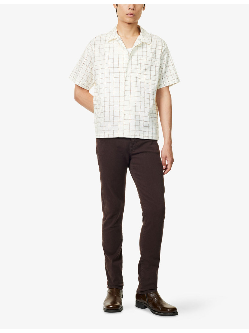 FRAME L'homme tapered-leg mid-rise stretch-denim jeans outlook