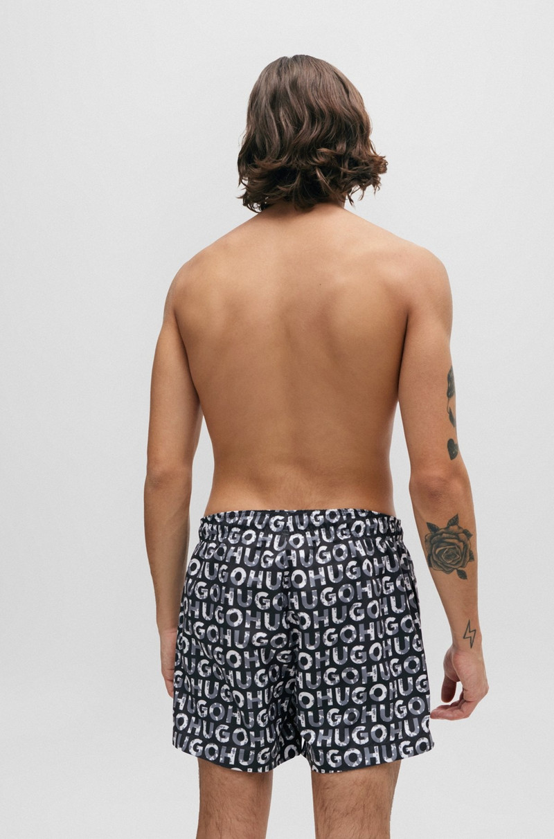 HUGO -MATERIAL SWIM SHORTS WITH LOGO PRINT outlook
