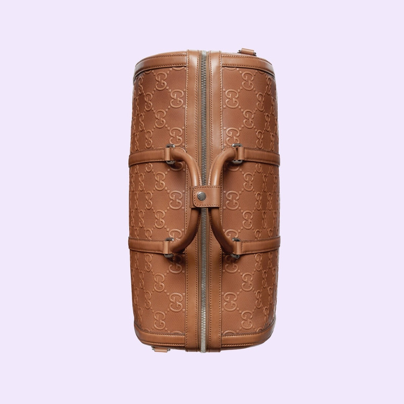 GG embossed duffle bag 7