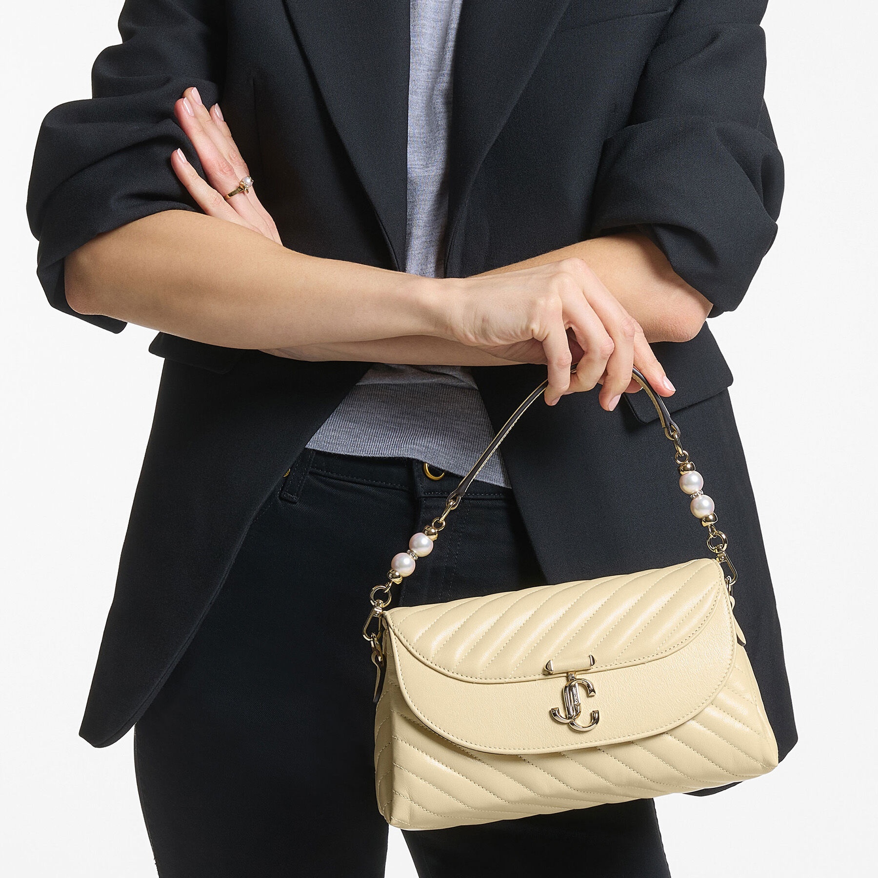 Avenue Curve Top Handle
Buttermilk Quilted Biker Leather Shoulder Bag with Pearl Detail - 2