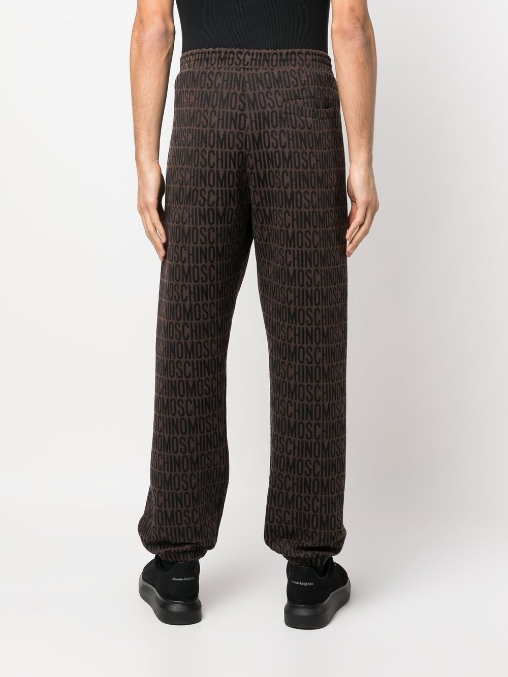 all-over embroidered logo track pants - 4