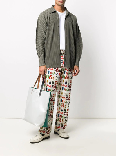 ISSEY MIYAKE monogram print cotton trousers outlook