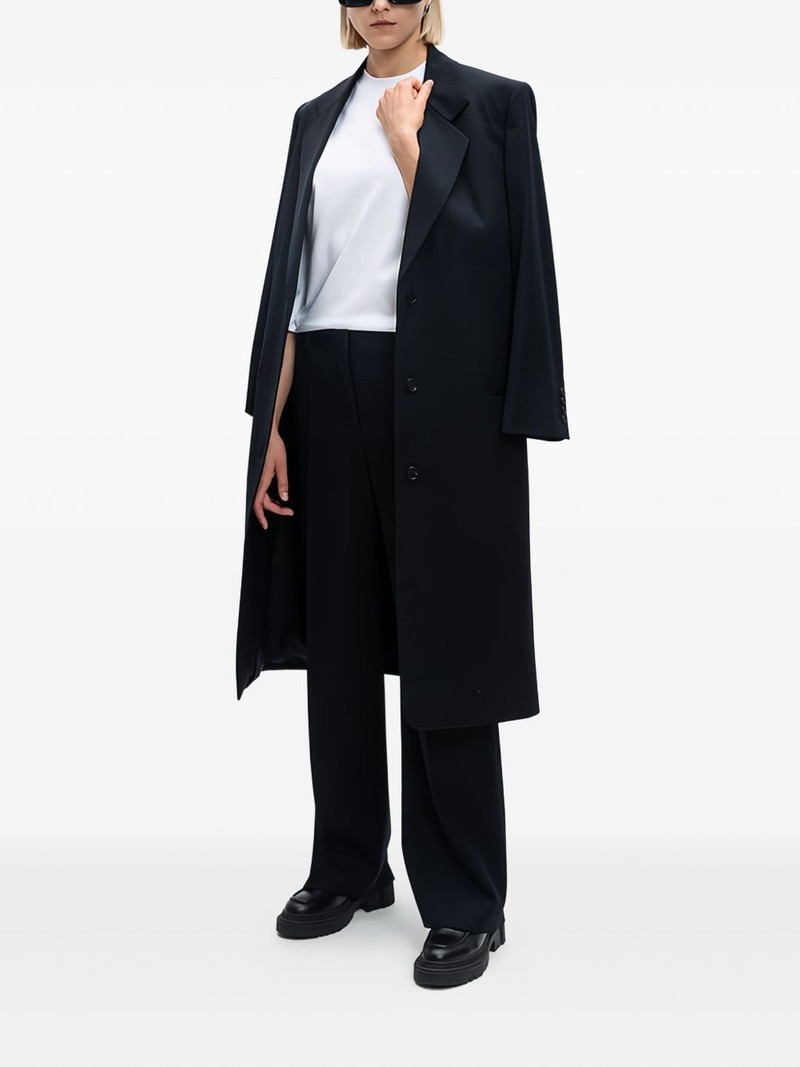 The Row pleated wide-leg trousers outlook