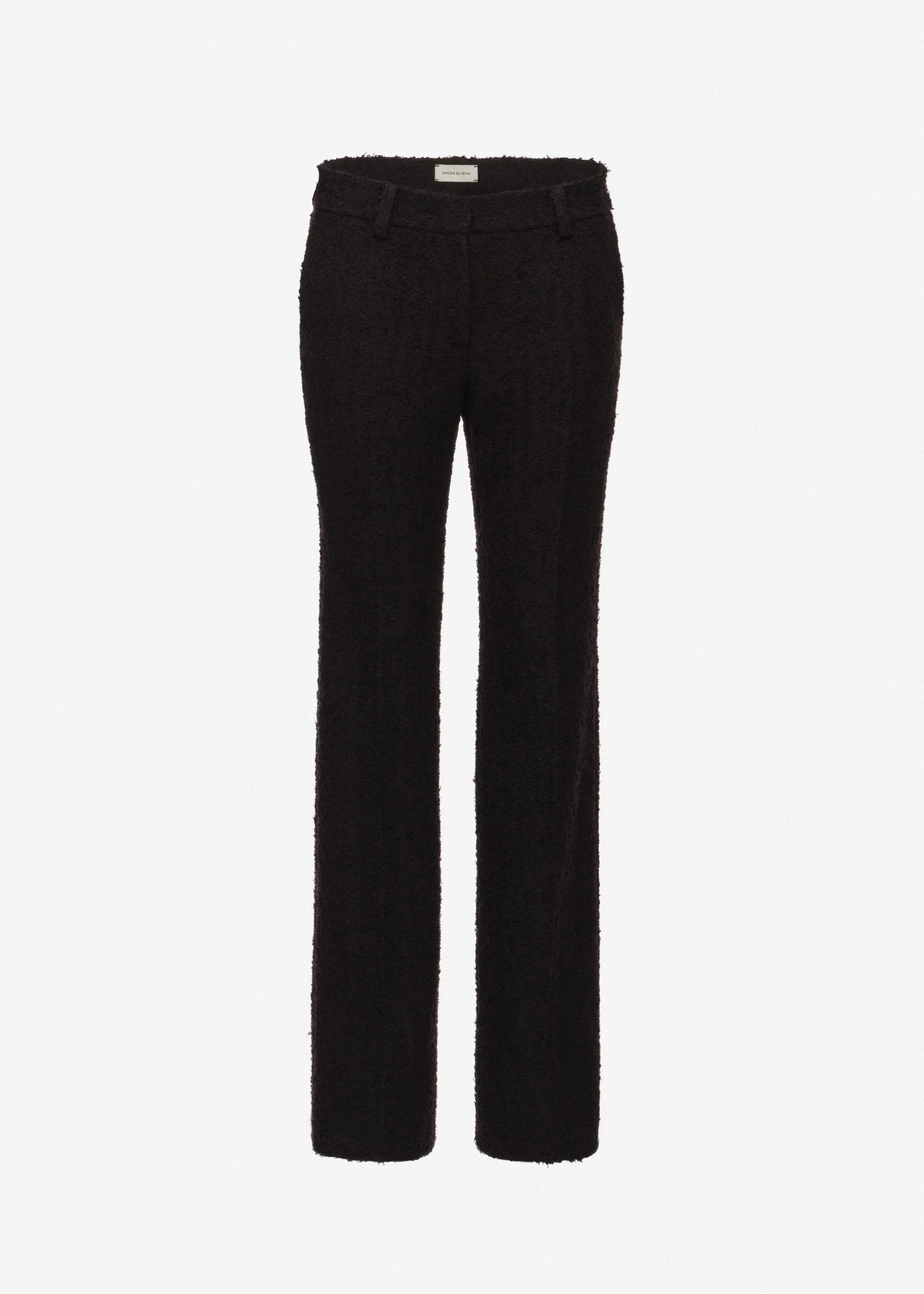 Flared tailored bouclé trousers in black - 1