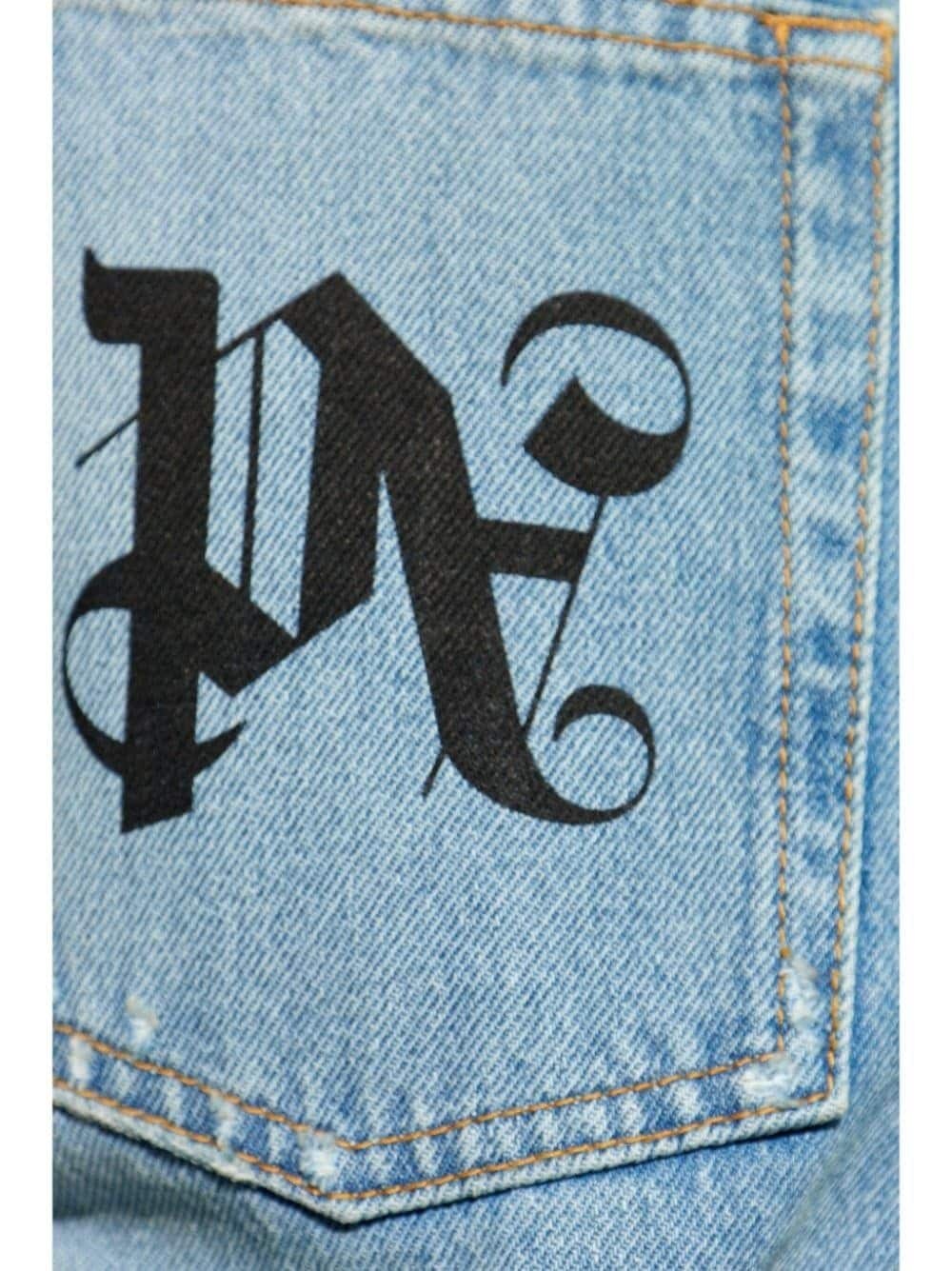 monogram-print jeans - 5
