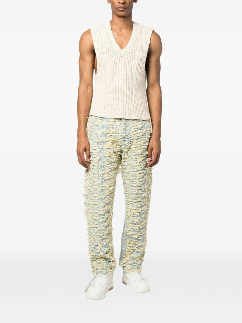 WHO DECIDES WAR distressed logo-patch jeans outlook