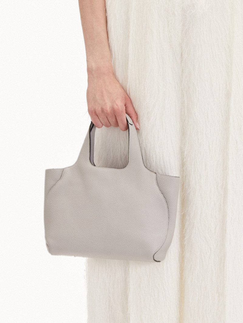 Oscar de la Renta THE MINI TOPAZ outlook