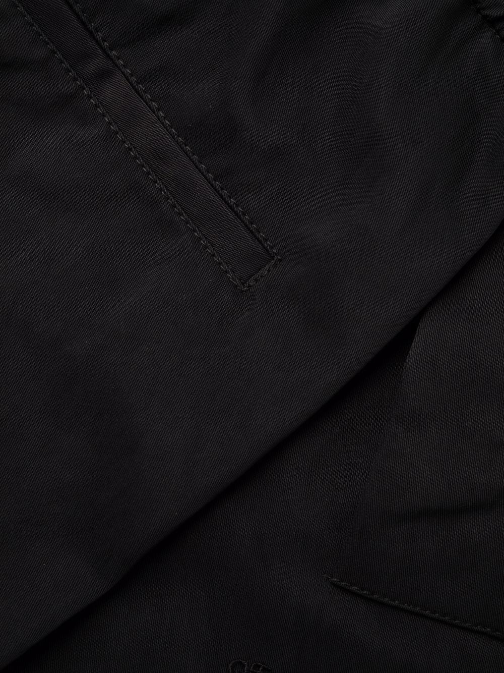 logo-print tailored trousers - 12
