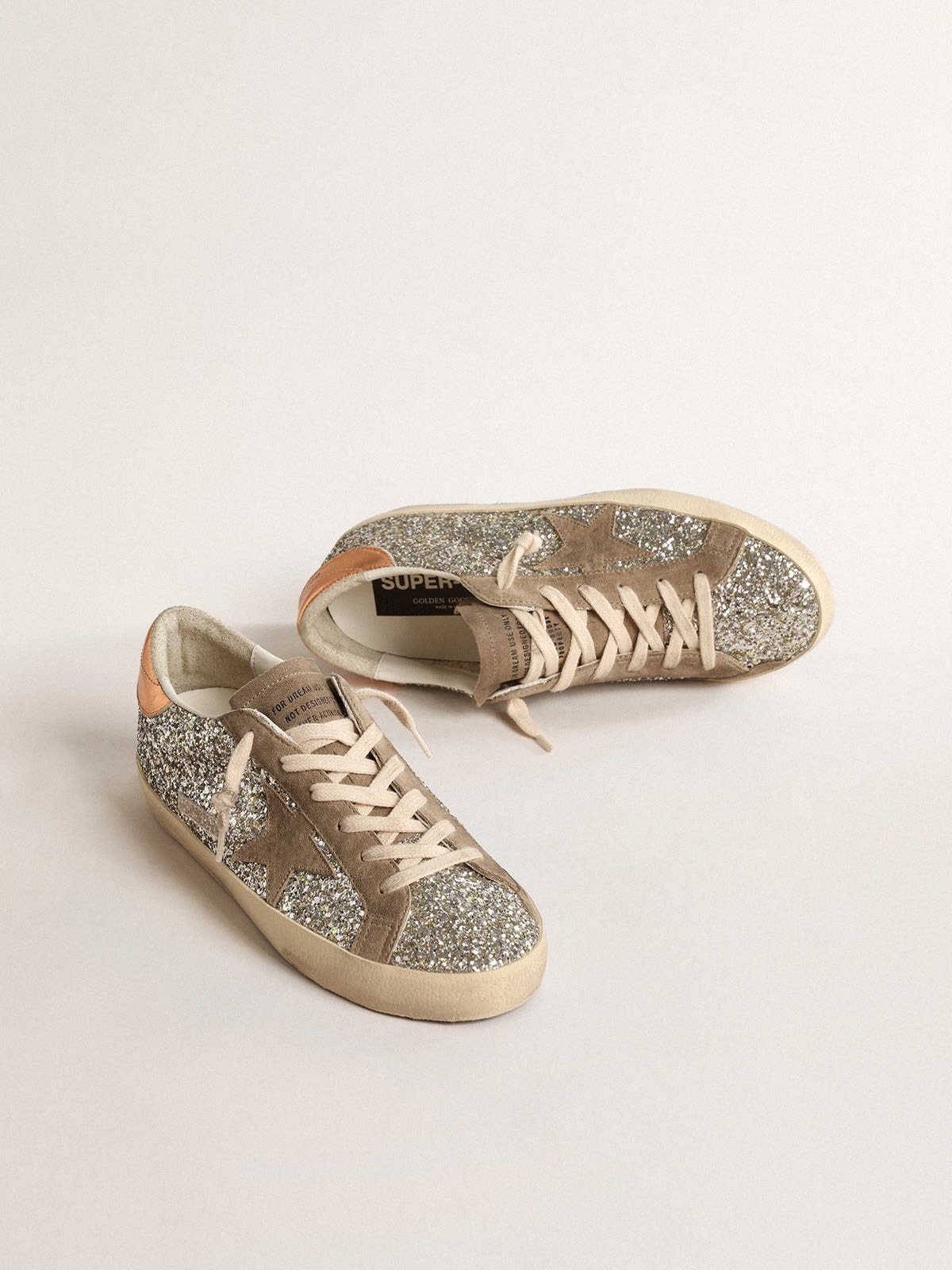 Golden Goose Super-Star in platinum glitter with dove-gray suede star |  REVERSIBLE