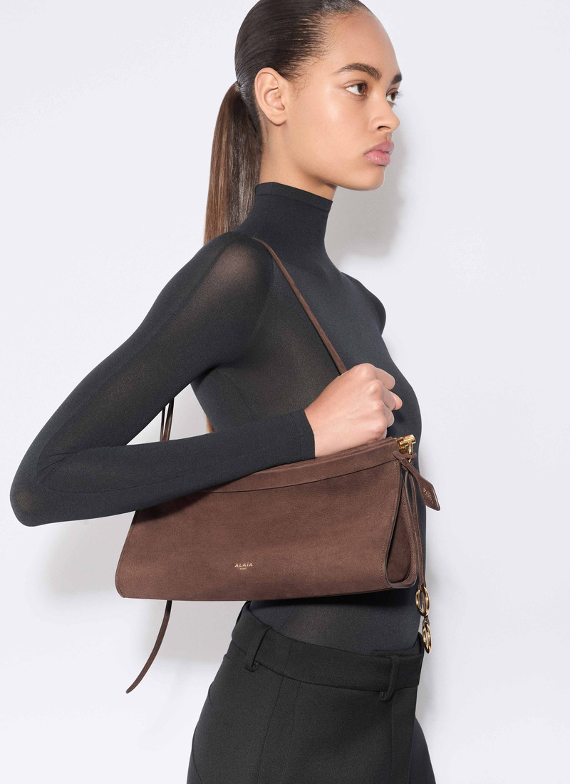 Alaïa LE CLICK EAST WEST MEDIUM BAG IN NUBUCK outlook