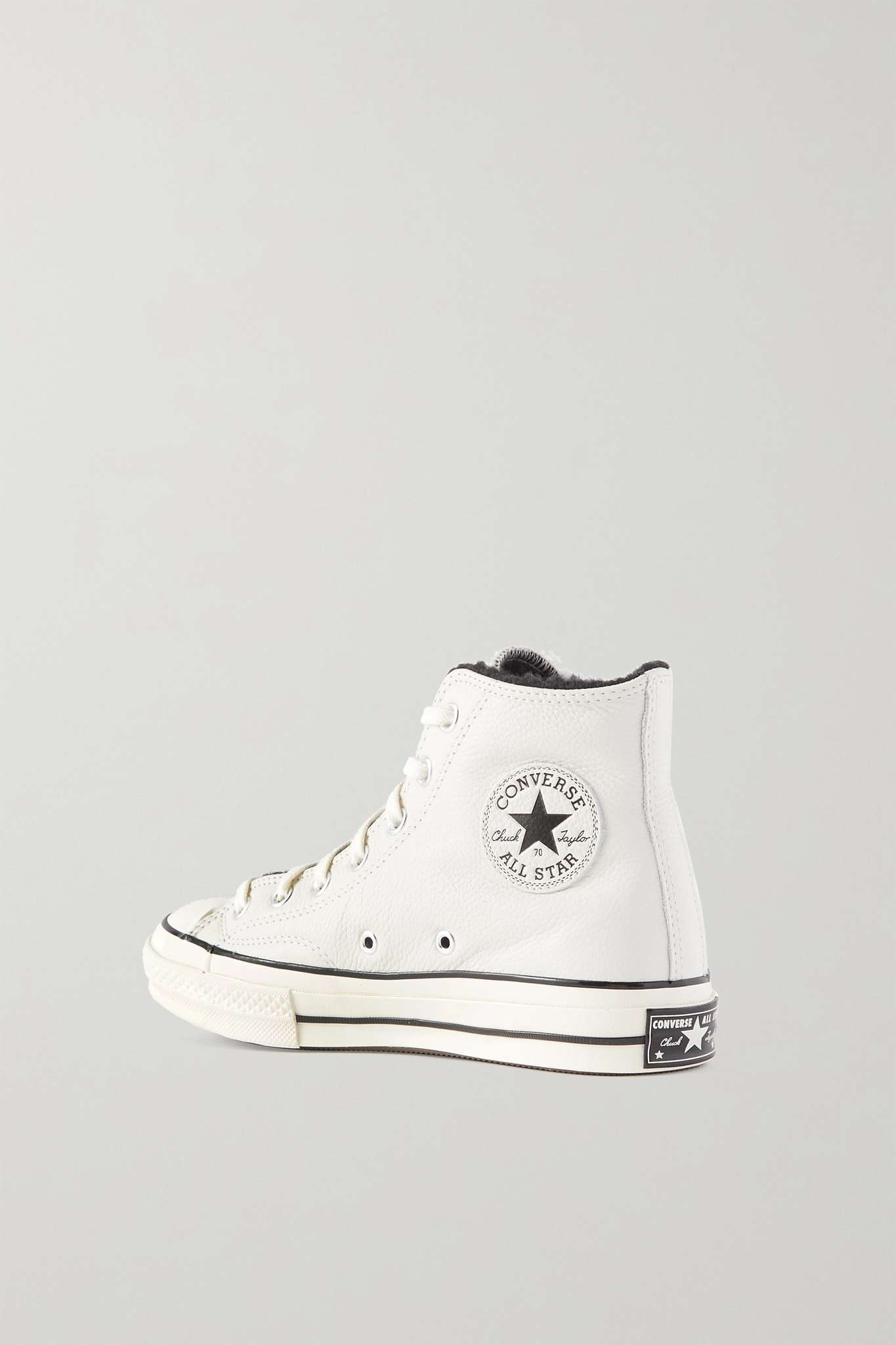 Fur lined high top converse on sale