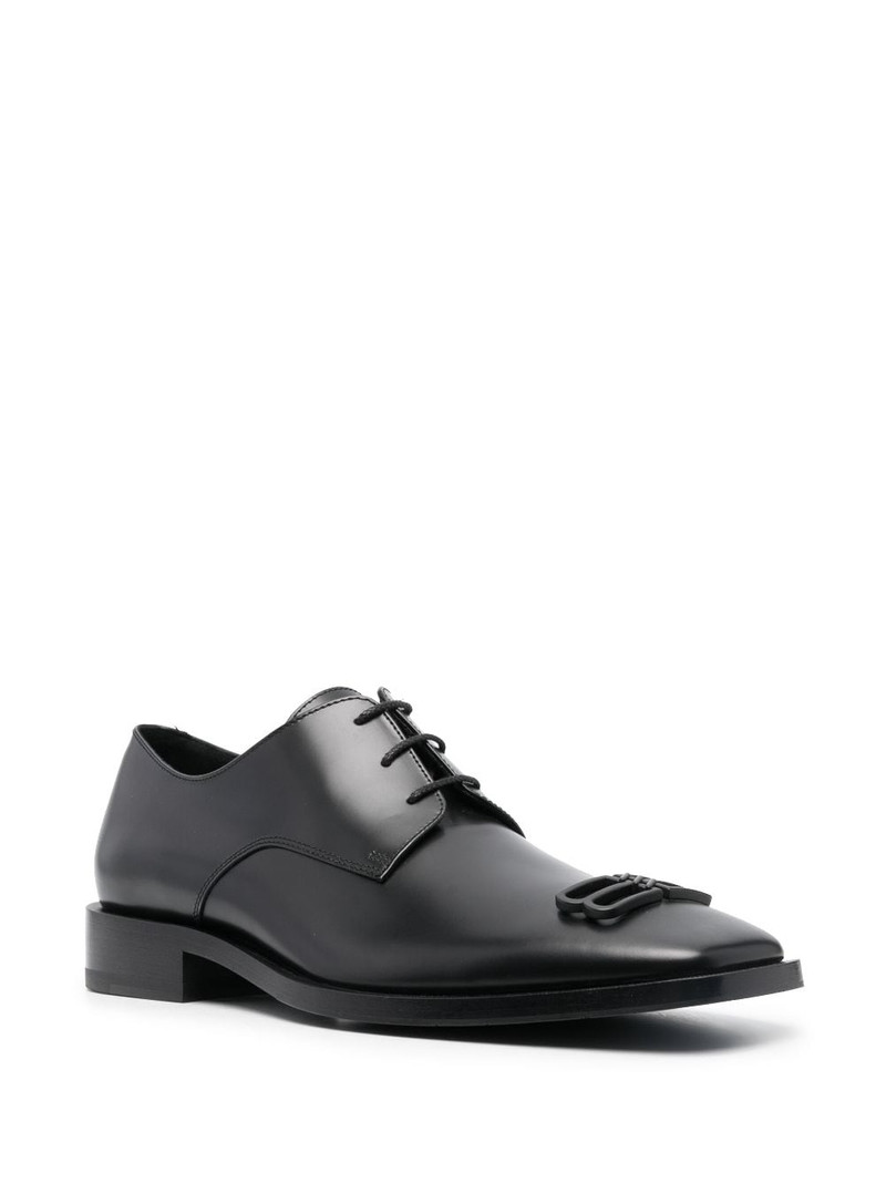 BALENCIAGA logo-embossed leather derby shoes outlook