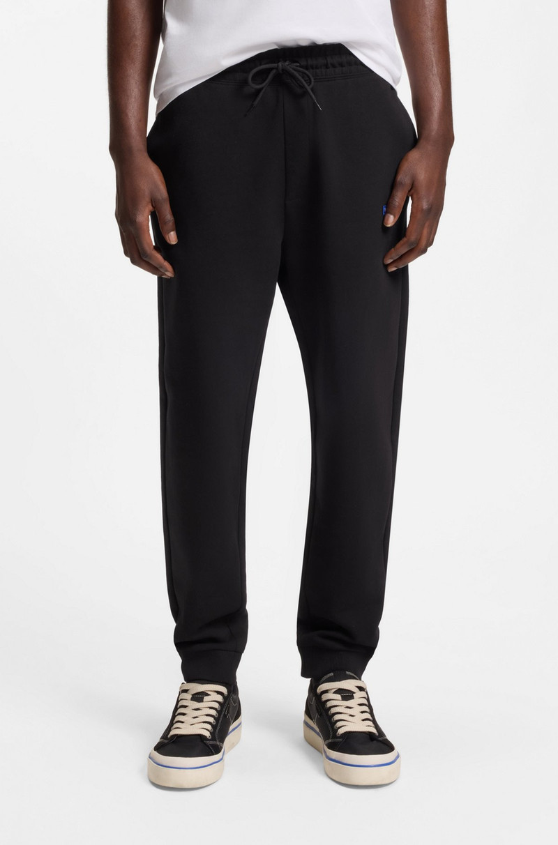 COTTON-TERRY SWEATPANTS WITH LOGO PATCH 2