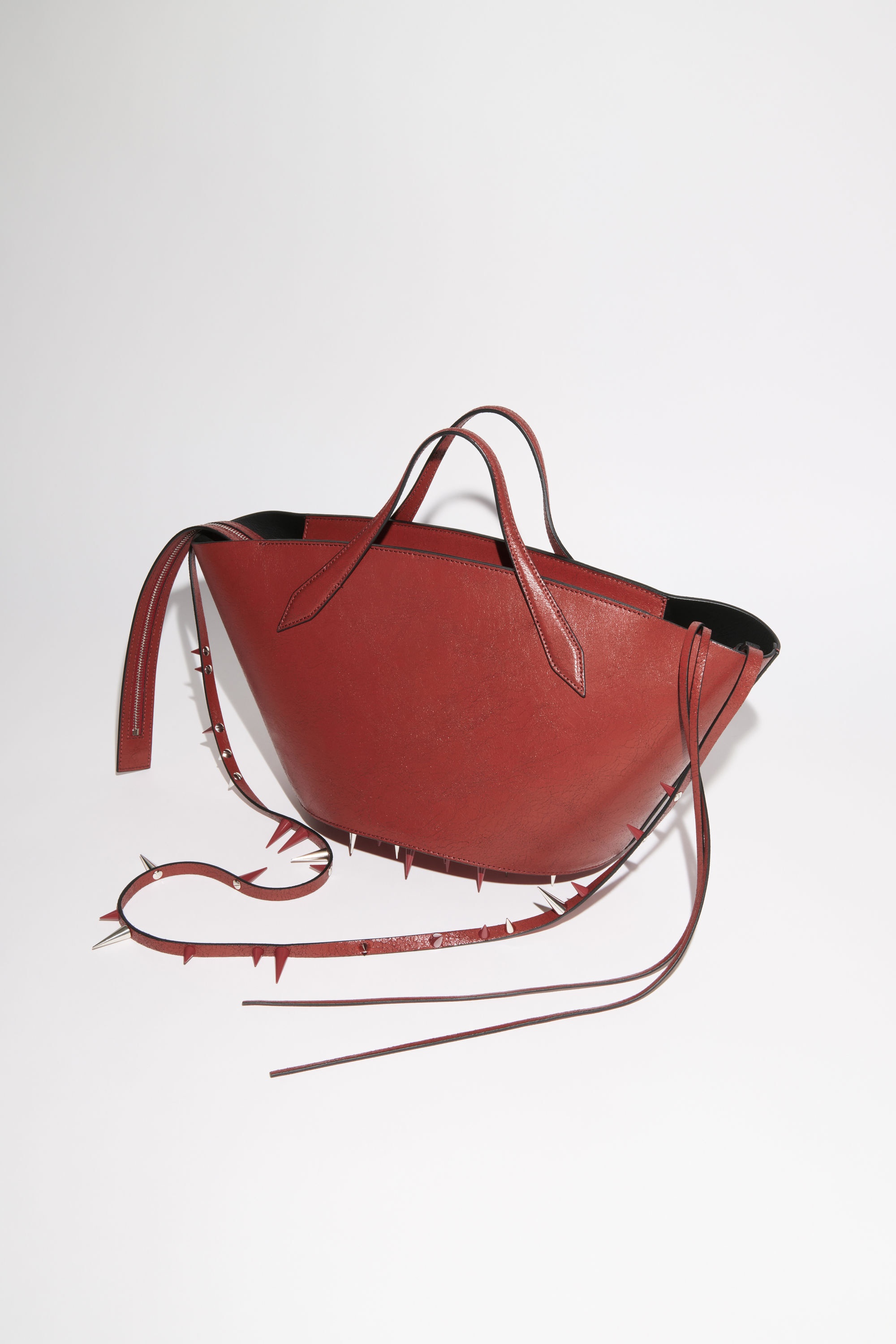 Acne Studios Spike shoulder bag - Red | acnestudios | REVERSIBLE
