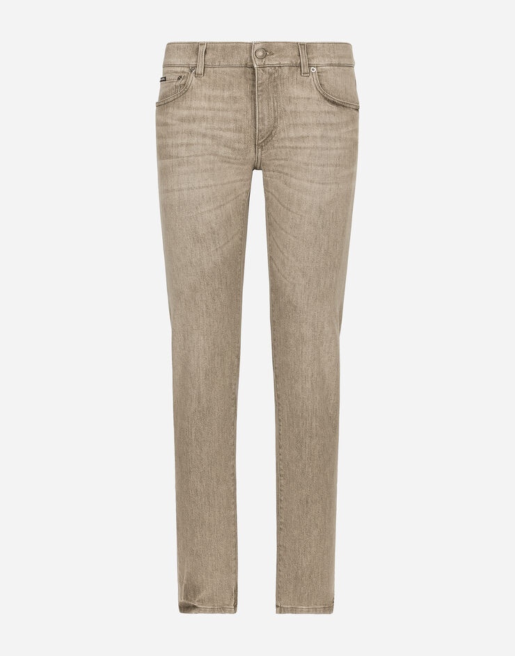 Washed stretch denim jeans with abrasions - 1