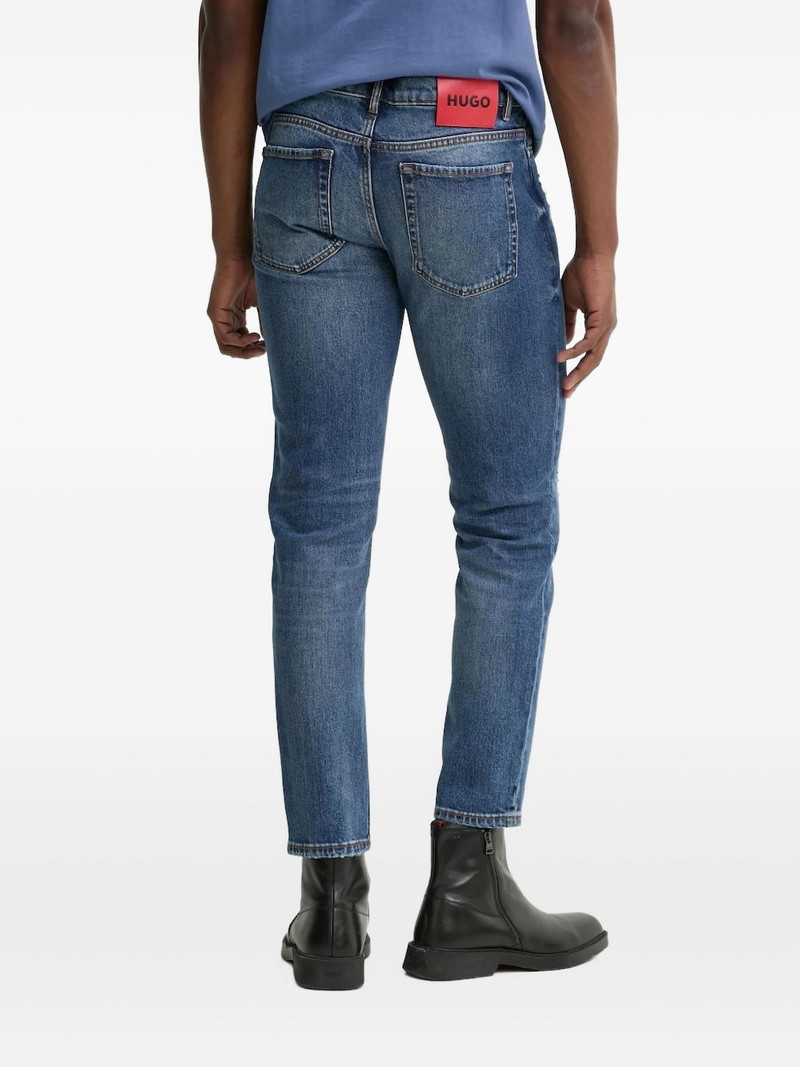 HUGO distressed tapered jeans outlook