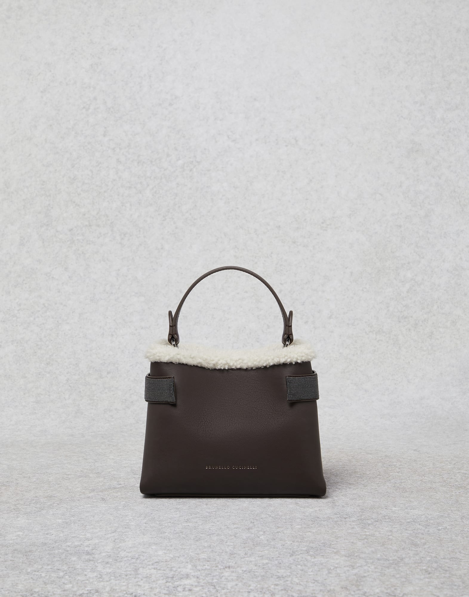 Matte calfskin bag with shearling trim and precious bands - 1