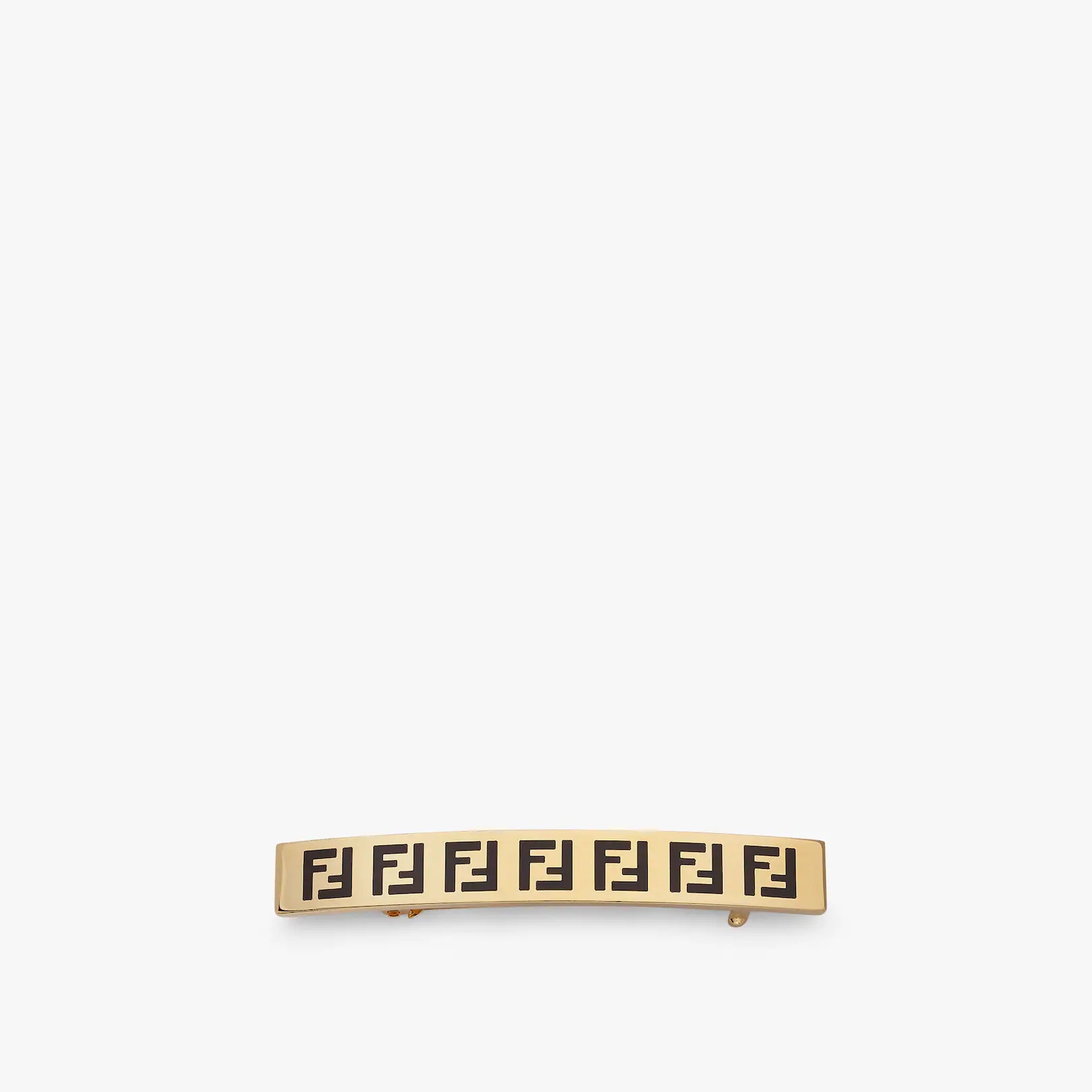 Gold-colored hair clip. 1