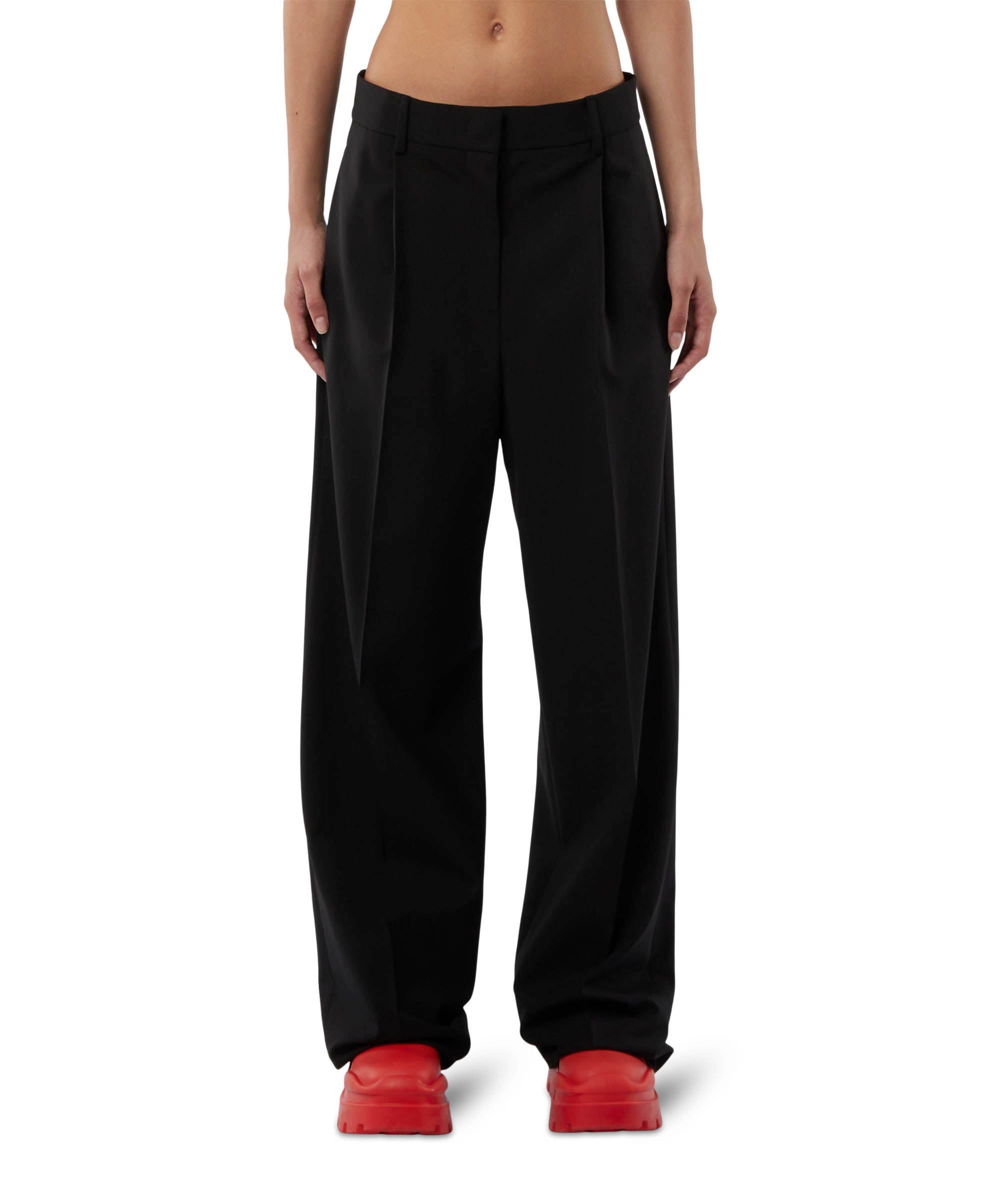 Solid-colour tailoring palazzo trousers in virgin wool - 1